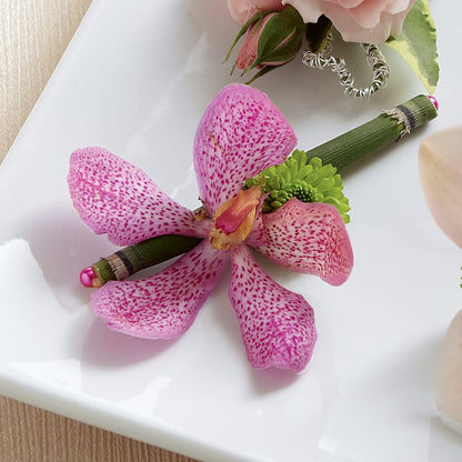 Pink Mokara Boutonniere –  White Eagle Flowers, Chicago IL
